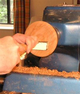 Shaping the back of the hand mirror